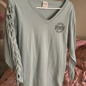 A victorious secret blue shirt see through sleeve